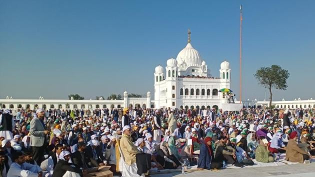 Indian and Pakistani devotees at Gurudwara Darbar Sahib on the occasion of the opening of the Kartarpur corridor, at Kartarpur. The Gurdwara Darbar Sahib is located across the Ravi river in Pakistan and is about four kilometres from the Dera Baba Nanak shrine in Gurdaspur. (Sameer Sehgal / HT Photo) Indian and Pakistani devotees at Gurudwara Darbar Sahib on the occasion of the opening of the Kartarpur corridor, at Kartarpur. The Gurdwara Darbar Sahib is located across the Ravi river in Pakistan and is about four kilometres from the Dera Baba Nanak shrine in Gurdaspur. (Sameer Sehgal / HT Photo)
