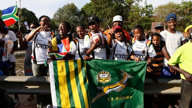 Girl rugby players from the Soweto Rugby School Academy sing as they wait for the national rugby team at the Hector Pieterson Museum. The sight of Mandela wearing a Bok shirt and handing South Africa captain Francois Pienaar the Webb Ellis Trophy after the 1995 World Cup final was iconic and immense in its own way. Last week, Yokohama took it to another level as the trophy was handed to Siya Kolisi, the first black player ever to captain South Africa in a test. (Guillem Sartorio / AFP) Girl rugby players from the Soweto Rugby School Academy sing as they wait for the national rugby team at the Hector Pieterson Museum. The sight of Mandela wearing a Bok shirt and handing South Africa captain Francois Pienaar the Webb Ellis Trophy after the 1995 World Cup final was iconic and immense in its own way. Last week, Yokohama took it to another level as the trophy was handed to Siya Kolisi, the first black player ever to captain South Africa in a test. (Guillem Sartorio / AFP)