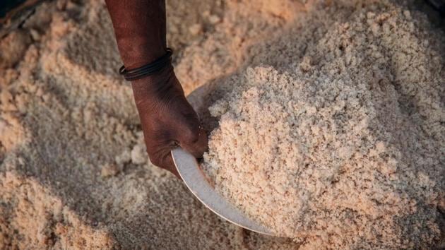 Ndaheni Mashele, 66, collects salt on the bank of the Klein Letaba River near Baleni, in the South African province of Limpopo. Hand-harvested from the banks of a remote river in northwestern South Africa, Baleni salt is developing a growing culinary following, as much for its unique taste as its back story. The salt, say locals, is sanctified by the spirits of their ancestors, for the crystals come from the water of a holy spring said to have healing powers. (Michele Spatari / AFP) Ndaheni Mashele, 66, collects salt on the bank of the Klein Letaba River near Baleni, in the South African province of Limpopo. Hand-harvested from the banks of a remote river in northwestern South Africa, Baleni salt is developing a growing culinary following, as much for its unique taste as its back story. The salt, say locals, is sanctified by the spirits of their ancestors, for the crystals come from the water of a holy spring said to have healing powers. (Michele Spatari / AFP)