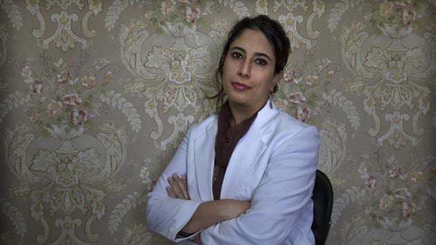 Doctor Sabahat Rasool tells the story of a pregnant woman who refused to be admitted in hospital because “there was no way she could communicate with her family and tell them that she needed to be admitted.” She was brought in unconscious the next day. “She survived but lost her unborn baby all because she could not afford to stay back the previous night for fear her family would think she was missing or kidnapped.” (Dar Yasin / AP) Doctor Sabahat Rasool tells the story of a pregnant woman who refused to be admitted in hospital because “there was no way she could communicate with her family and tell them that she needed to be admitted.” She was brought in unconscious the next day. “She survived but lost her unborn baby all because she could not afford to stay back the previous night for fear her family would think she was missing or kidnapped.” (Dar Yasin / AP)