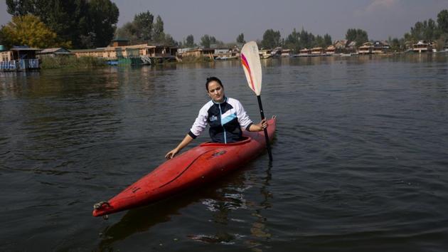 A Kashmiri kayaker Mehak Peer, 26, is seen during her first practice session since August 5, on the Dal Lake in Srinagar. “Because of the lockdown and internet blockade we have missed three tournaments. I was hoping to make it to the international level but after missing these national tournaments, that is no longer possible,” Peer said. (Dar Yasin / AP) A Kashmiri kayaker Mehak Peer, 26, is seen during her first practice session since August 5, on the Dal Lake in Srinagar. “Because of the lockdown and internet blockade we have missed three tournaments. I was hoping to make it to the international level but after missing these national tournaments, that is no longer possible,” Peer said. (Dar Yasin / AP)