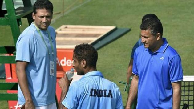 India's non playing captain Mahesh Bhupathi with coach Jishan Ali and player Ramkumar Ramanathan. (AP) India's non playing captain Mahesh Bhupathi with coach Jishan Ali and player Ramkumar Ramanathan. (AP)