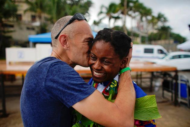 Georges, a member of the Haiti national cycling team is kissed by her coach Yann Dejan after receiving a bronze medal. Administrative delay for visas and other difficulties due to Haiti’s general disarray meant the training was reduced from five months to two for the men and one for the women, according to Dejan. “I hope to go further with cycling, I wish the Haitian Federation and sport ministry would keep us training,” said Georges. (Alexandre Meneghini / REUTERS)