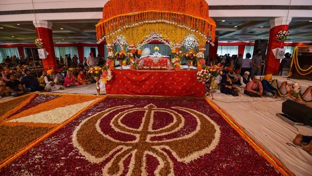 Devotees pay obeisance at Gurdwara Rakab Ganj Sahib on the occasion of the 550th birth anniversary of Guru Nanak Dev, in New Delhi. (Manvender Vashist / PTI) Devotees pay obeisance at Gurdwara Rakab Ganj Sahib on the occasion of the 550th birth anniversary of Guru Nanak Dev, in New Delhi. (Manvender Vashist / PTI)