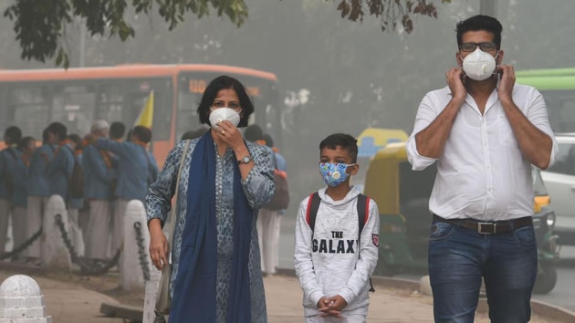 People wearing masks amid heavy smog in New Delhi last week. The air quality dipped to hazardous ‘severe plus’ category.(PTI Photo) People wearing masks amid heavy smog in New Delhi last week. The air quality dipped to hazardous ‘severe plus’ category.(PTI Photo)
