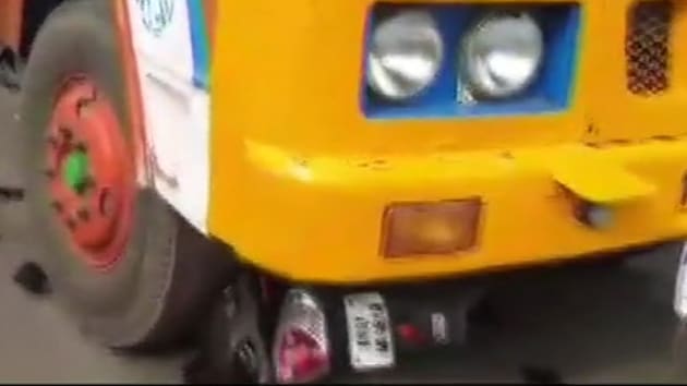 A woman rider was on Monday morning hit by a truck while she was trying to avoid an AIADMK flagpole. (ANI Photo) A woman rider was on Monday morning hit by a truck while she was trying to avoid an AIADMK flagpole. (ANI Photo)