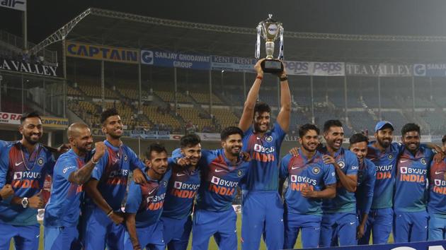Players of Indian cricket team pose with the winner's trophy after their win in the third Twenty20I against Bangladesh. (AP) Players of Indian cricket team pose with the winner's trophy after their win in the third Twenty20I against Bangladesh. (AP)