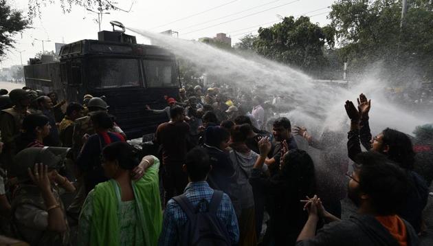 Students of Jawaharlal Nehru University (JNU) are fired upon by a water cannon during a protest outside the All India Council for Technical Education during the JNU convocation, against fee hikes, in New Delhi, India, on Monday, November 11, 2019. (Biplov Bhuyan/HT PHOTO) Students of Jawaharlal Nehru University (JNU) are fired upon by a water cannon during a protest outside the All India Council for Technical Education during the JNU convocation, against fee hikes, in New Delhi, India, on Monday, November 11, 2019. (Biplov Bhuyan/HT PHOTO)