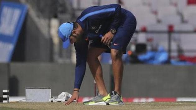 File image of India opener Rohit Sharma inspecting pitch ahead of a match.(AP)