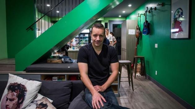 Jeremiah Adler, founder and CEO of UP(st)ART poses in one of his homes in Los Angeles. He said each capsule costs roughly half the rent of a studio in Los Angeles -- the US entertainment capital, and one of its most expensive cities. Cheaper options exist, but UP(st)ART offers a good, central location and modern buildings equipped with a gym, dance classes, recording studio, art workshop and free cleaning and laundry services. Among the rules: women and men sleep apart. (Apu Gomes / AFP) Jeremiah Adler, founder and CEO of UP(st)ART poses in one of his homes in Los Angeles. He said each capsule costs roughly half the rent of a studio in Los Angeles -- the US entertainment capital, and one of its most expensive cities. Cheaper options exist, but UP(st)ART offers a good, central location and modern buildings equipped with a gym, dance classes, recording studio, art workshop and free cleaning and laundry services. Among the rules: women and men sleep apart. (Apu Gomes / AFP)