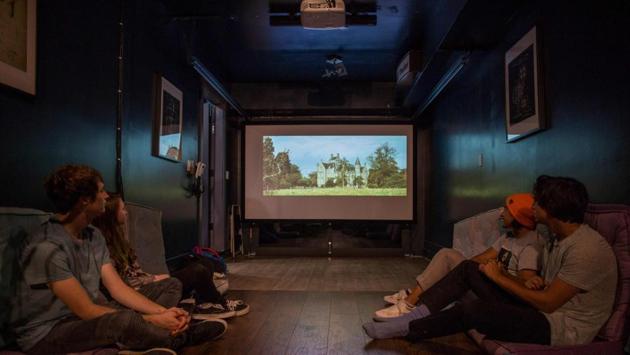 Young artists watch a film in the movie theater room at the UP(st)ART house. For Dana Cuff, an architect and professor at the University of California, Los Angeles (UCLA), this type of community presents only a short-term solution. “We basically need to be developing a huge range of options for the kinds of housing that are available,” she said. “To me, co-living pods... are symptoms of this deep need for a much greater range of housing alternatives.” (Apu Gomes / AFP) Young artists watch a film in the movie theater room at the UP(st)ART house. For Dana Cuff, an architect and professor at the University of California, Los Angeles (UCLA), this type of community presents only a short-term solution. “We basically need to be developing a huge range of options for the kinds of housing that are available,” she said. “To me, co-living pods... are symptoms of this deep need for a much greater range of housing alternatives.” (Apu Gomes / AFP)
