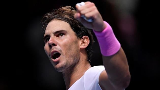 Spain's Rafael Nadal celebrates winning his group stage match against Russia's Daniil Medvedev.(REUTERS)