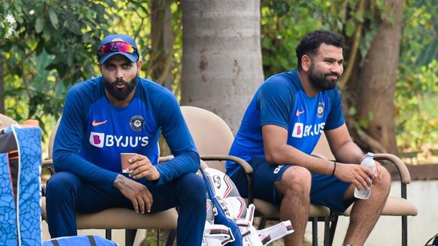 Mohali: Indian cricketers Rohit Sharma (R) and Ravindra Jadeja during a practice session.(PTI)