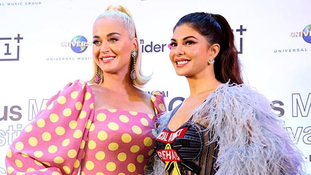 Singer Katy Perry and actor Jacqueline Fernandez pose during the media conference before the One Plus Music Festival in Mumbai on Tuesday.(ANI)