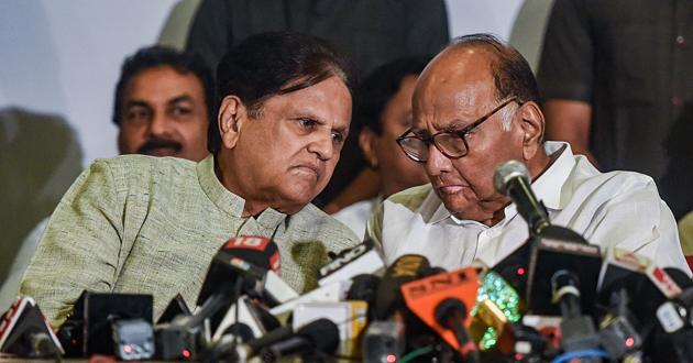 Nationalist Congress Party (NCP) Chief Sharad Pawar and Congress leader Ahmed Patel during a joint press conference on November 12, in Mumbai. NCP president Sharad Pawar with Congress leaders deputed by Sonia Gandhi said that the two parties will discuss and evolve a consensus on what should be the policies and programmes if the Shiv Sena was to be supported. (PTI) Nationalist Congress Party (NCP) Chief Sharad Pawar and Congress leader Ahmed Patel during a joint press conference on November 12, in Mumbai. NCP president Sharad Pawar with Congress leaders deputed by Sonia Gandhi said that the two parties will discuss and evolve a consensus on what should be the policies and programmes if the Shiv Sena was to be supported. (PTI)