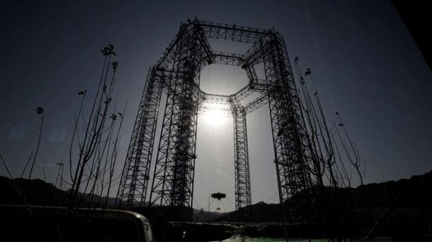 A lander for China's Mars mission is seen after a hovering-and-obstacle avoidance test at a test facility in Huailai, Hebei province, China. (Reuters Photo) A lander for China's Mars mission is seen after a hovering-and-obstacle avoidance test at a test facility in Huailai, Hebei province, China. (Reuters Photo)