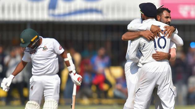 Indian bowler Mohammed Shami hugs captain Virat Kholi after taking the wicket of Bangladesh batsman M Hasan during the first day of the first Test match between India and Bangladesh at the Holkar Cricket Stadium, in Indore. (PTI) Indian bowler Mohammed Shami hugs captain Virat Kholi after taking the wicket of Bangladesh batsman M Hasan during the first day of the first Test match between India and Bangladesh at the Holkar Cricket Stadium, in Indore. (PTI)
