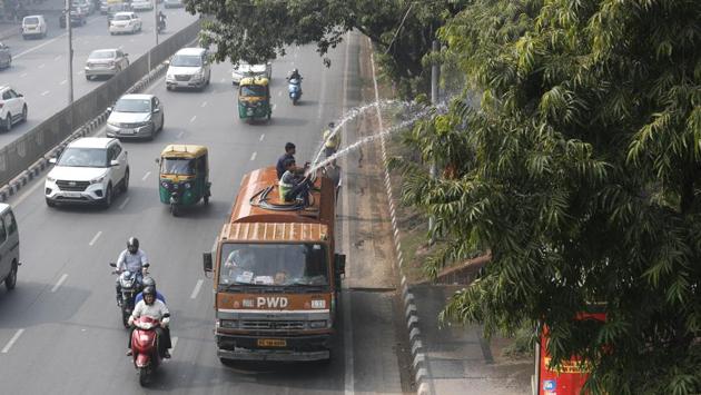Civic workers spray water to clear the dust on tress as the city is enveloped under thick smog. Minimum temperatures are likely to rise by 2 to 3 degree C during next two days over northwest India but minimum temperatures will fall over east and adjoining central India by 2-3 degree C in the next couple of days. (Manish Swarup / AP) Civic workers spray water to clear the dust on tress as the city is enveloped under thick smog. Minimum temperatures are likely to rise by 2 to 3 degree C during next two days over northwest India but minimum temperatures will fall over east and adjoining central India by 2-3 degree C in the next couple of days. (Manish Swarup / AP)