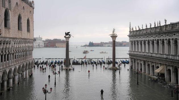 A view of the flooded St. Mark's Square, the Doge's Palace (L), the Lion of St. Mark winged bronze statue and the Venetian lagoon. The fire brigade said it had carried out over 400 operations as well as laying on extra boats as water ambulances. Around 160 firefighters were deployed to rescue people stranded on jetties and to recover boats broken free from their moorings. (Marco Bertorello / AFP) A view of the flooded St. Mark's Square, the Doge's Palace (L), the Lion of St. Mark winged bronze statue and the Venetian lagoon. The fire brigade said it had carried out over 400 operations as well as laying on extra boats as water ambulances. Around 160 firefighters were deployed to rescue people stranded on jetties and to recover boats broken free from their moorings. (Marco Bertorello / AFP)