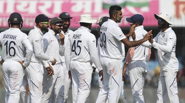 India's Ravichandran Ashwin, third right, celebrates with teammates the dismissal of Bangladesh's Mahmudullah. (AP)