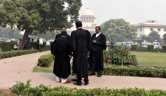 A view of the Supreme Court after it announced its verdict on former Karnataka Speaker's order disqualifying 17 MLAs, in New Delhi on Wednesday, November 13. (Sonu Mehta/HT PHOTO) A view of the Supreme Court after it announced its verdict on former Karnataka Speaker's order disqualifying 17 MLAs, in New Delhi on Wednesday, November 13. (Sonu Mehta/HT PHOTO)
