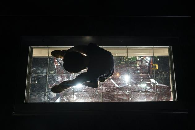 A young boy sits on a glass floor at Tokyo Tower's main observation deck. (Jae C. Hong / AP) A young boy sits on a glass floor at Tokyo Tower's main observation deck. (Jae C. Hong / AP)