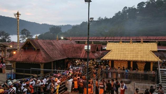 Hindu devotees wait in queues inside the premises of the Sabarimala temple in Pathanamthitta district in Kerala. (REUTERS) Hindu devotees wait in queues inside the premises of the Sabarimala temple in Pathanamthitta district in Kerala. (REUTERS)