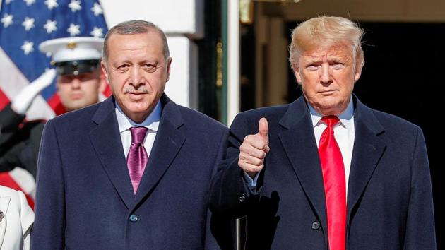 U.S. President Donald Trump welcomes Turkey's President Tayyip Erdogan at the White House in Washington. In a meeting at the White House on Wednesday, U.S. President Donald Trump urged Erdogan to abandon the S-400 systems that began arriving in Turkey in July despite threats of sanctions from Washington. (Tom Brenner / REUTERS)