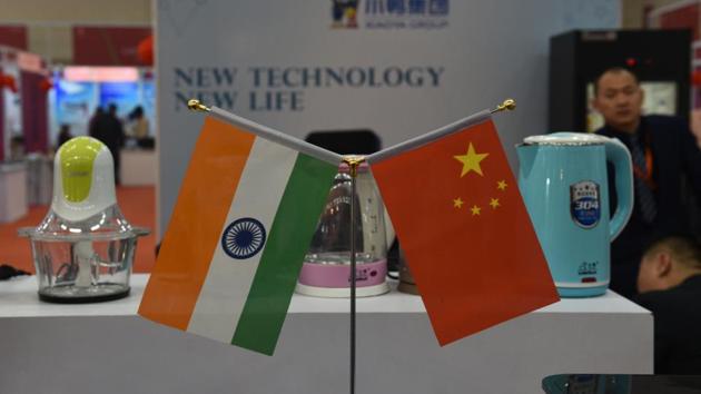 Indian and Chinese flags are seen at a Chinese stall during the India International Trade Fair. The multi-product exhibition offers an equal opportunity for large corporations, MSMEs, non-government agencies, artisans, self-help groups (SHGs) to promote their products and services to a very large sample of potential customers. (Vipin Kumar / HT Photo) Indian and Chinese flags are seen at a Chinese stall during the India International Trade Fair. The multi-product exhibition offers an equal opportunity for large corporations, MSMEs, non-government agencies, artisans, self-help groups (SHGs) to promote their products and services to a very large sample of potential customers. (Vipin Kumar / HT Photo)
