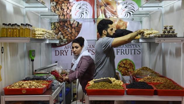 Afghani participants prepare their stall during the India International Trade Fair. This year the status of ‘Partner Country’ has been accorded to ‘the Islamic Republic of Afghanistan’ and ‘the Republic of Korea’ will be the ‘Focus Country’. (Vipin Kumar / HT Photo) Afghani participants prepare their stall during the India International Trade Fair. This year the status of ‘Partner Country’ has been accorded to ‘the Islamic Republic of Afghanistan’ and ‘the Republic of Korea’ will be the ‘Focus Country’. (Vipin Kumar / HT Photo)