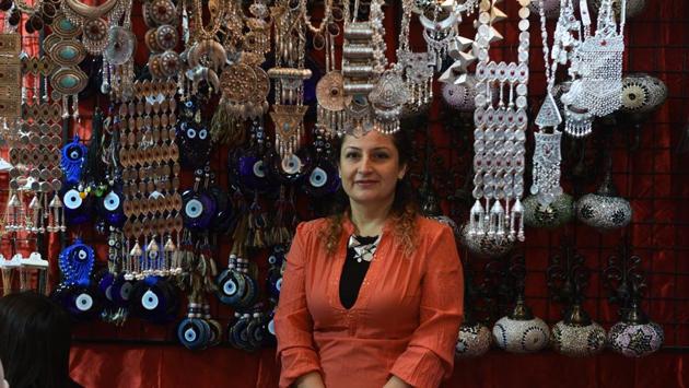 A woman poses for a photograph inside a Turkish stall at the India International Trade Fair. Entry tickets for business days per person will be available for Rs 500 and season ticket for Rs 1,800. (Vipin Kumar / HT Photo) A woman poses for a photograph inside a Turkish stall at the India International Trade Fair. Entry tickets for business days per person will be available for Rs 500 and season ticket for Rs 1,800. (Vipin Kumar / HT Photo)