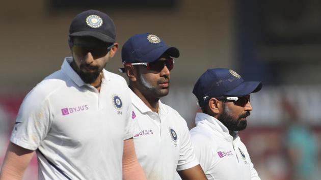 Indian players Ishant Sharma, left, Ravichandran Ashwin, center, and Mohammed Shami leave the field.(AP)