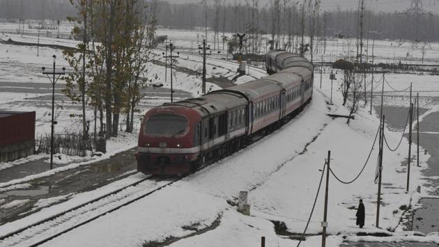 A train crosses a snow-covered railway track in Narbal area, some 30 kilometres from Srinagar, Jammu and Kashmir. The government conducted a trial run of the inter-district rail services in Kashmir. The service remained shut since August 05, 2019. (Waseem Andrabi / HT Photo) A train crosses a snow-covered railway track in Narbal area, some 30 kilometres from Srinagar, Jammu and Kashmir. The government conducted a trial run of the inter-district rail services in Kashmir. The service remained shut since August 05, 2019. (Waseem Andrabi / HT Photo)