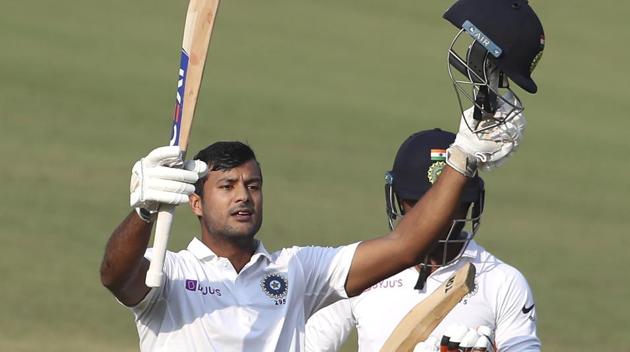 Mayank Agarwal raises his bat and helmet to celebrate scoring a double century against Bangladesh in Indore. (AP) Mayank Agarwal raises his bat and helmet to celebrate scoring a double century against Bangladesh in Indore. (AP)