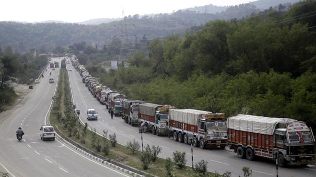 Trucks stranded at Jammu-Srinagar National Highway following a landslide in Ramban district. (HT Photo) Trucks stranded at Jammu-Srinagar National Highway following a landslide in Ramban district. (HT Photo)