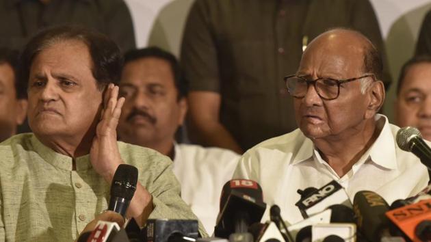 Congress leader Ahmed Patel and NCP leader Sharad Pawar address the media during a joint press conference, at YB Chavan Center, in Mumbai. Maharashtra has been under President’s Rule since Tuesday after October’s election delivered a fractured mandate and power-sharing talks between the BJP and the Sena broke down. Snubbed by its long-time ally, Sena approached the opposition - the Congress and the NCP - to propose an alliance to keep the BJP from power. (Kunal Patil/ HT Photo) Congress leader Ahmed Patel and NCP leader Sharad Pawar address the media during a joint press conference, at YB Chavan Center, in Mumbai. Maharashtra has been under President’s Rule since Tuesday after October’s election delivered a fractured mandate and power-sharing talks between the BJP and the Sena broke down. Snubbed by its long-time ally, Sena approached the opposition - the Congress and the NCP - to propose an alliance to keep the BJP from power. (Kunal Patil/ HT Photo)