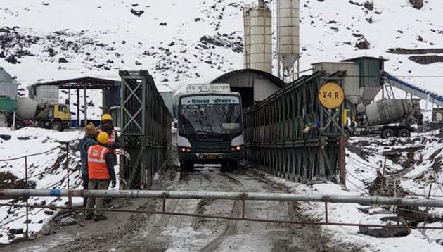 The bus outside the Rohtang tunnel’s northern portal in Lahaul and Spiti on Sunday. (ANI) The bus outside the Rohtang tunnel’s northern portal in Lahaul and Spiti on Sunday. (ANI)