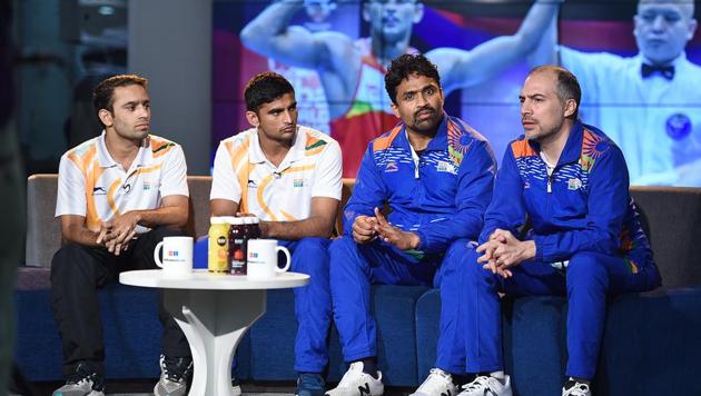 Amit Panghal, Manish Kaushik, coach CS Kutappa and coach Santiago Nieva during an interview with Hindustan Times.(Raj K Raj/HT PHOTO)