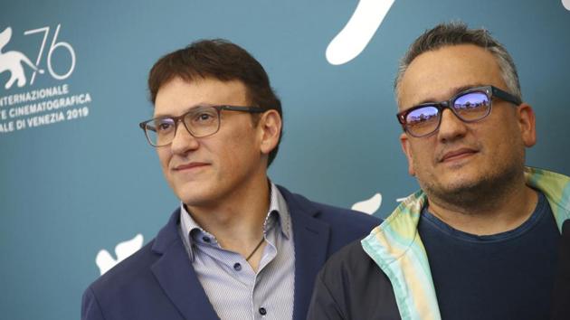 Producers Anthony Russo, left, and Joe Russo pose for photographers at the photo call for the film Mosul at the 76th edition of the Venice Film Festival in Venice.(Joel C Ryan/Invision/AP) Producers Anthony Russo, left, and Joe Russo pose for photographers at the photo call for the film Mosul at the 76th edition of the Venice Film Festival in Venice.(Joel C Ryan/Invision/AP)
