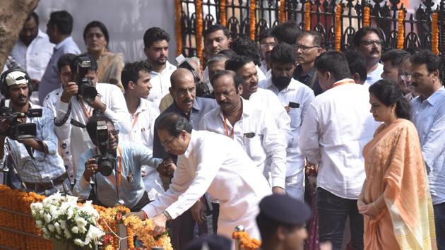 Shiv Sena President Uddhav Thackeray along with his wife Rashmi Thackeray pays tribute at the memorial of Shiv Sena founder Balasaheb Thackeray on his 7th death anniversary at Shivaji Park in Mumbai on Sunday. (Kunal Patil/HT Photo) Shiv Sena President Uddhav Thackeray along with his wife Rashmi Thackeray pays tribute at the memorial of Shiv Sena founder Balasaheb Thackeray on his 7th death anniversary at Shivaji Park in Mumbai on Sunday. (Kunal Patil/HT Photo)