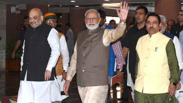 Prime Minister Narendra Modi waves as he, along with Home Minister Amit Shah, Union Parliamentary Affairs Minister Pralhad Joshi and other leaders leave after attending the all-party meeting ahead of the winter session of Parliament in New Delhi on Sunday. (Arvind Yadav/HT PHOTO) Prime Minister Narendra Modi waves as he, along with Home Minister Amit Shah, Union Parliamentary Affairs Minister Pralhad Joshi and other leaders leave after attending the all-party meeting ahead of the winter session of Parliament in New Delhi on Sunday. (Arvind Yadav/HT PHOTO)