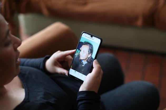 Natalia Perez, the widow of Alex Nunez, who was beaten to death during military curfew, shows a picture she took of Nunez on her phone. Nunez made it home that night but was rushed to hospital, where he died from his injuries shortly afterwards. “Only 5% of his brain was working. They couldn’t operate,” said Perez. “He had a brain injury, cerebral edema and fractured skull.” (Ivan Alvarado / REUTERS) Natalia Perez, the widow of Alex Nunez, who was beaten to death during military curfew, shows a picture she took of Nunez on her phone. Nunez made it home that night but was rushed to hospital, where he died from his injuries shortly afterwards. “Only 5% of his brain was working. They couldn’t operate,” said Perez. “He had a brain injury, cerebral edema and fractured skull.” (Ivan Alvarado / REUTERS)