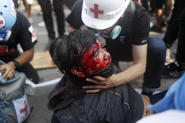 The unrest was sparked by a hike in metro fees but spread to encompass pent-up grievances over income inequality and soaring living costs. The protests have left at least 23 dead, around 7,000 detained, and 1,659 demonstrators and 800 police officers injured, according to authorities and rights groups. The demonstrations have sometimes devolved into arson, riots and looting, wreaking billions of dollars of damage to infrastructure and businesses. Santiago’s public transport system has been hobbled. (Jorge Silva / REUTERS) The unrest was sparked by a hike in metro fees but spread to encompass pent-up grievances over income inequality and soaring living costs. The protests have left at least 23 dead, around 7,000 detained, and 1,659 demonstrators and 800 police officers injured, according to authorities and rights groups. The demonstrations have sometimes devolved into arson, riots and looting, wreaking billions of dollars of damage to infrastructure and businesses. Santiago’s public transport system has been hobbled. (Jorge Silva / REUTERS)