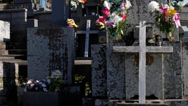 A statue of Virgin Mary is seen on a gravestone. Exact numbers of Hidden Christians are hard to come by, but no one disputes their ranks are shrinking. Only around 1% of Japan’s population is Christian. Shigeo Nakazono, curator at a museum on Ikitsuki Island, said there were probably about 300 believers in four groups there, down from 2,000 in 20 groups three decades ago. (Issei Kato / REUTERS) A statue of Virgin Mary is seen on a gravestone. Exact numbers of Hidden Christians are hard to come by, but no one disputes their ranks are shrinking. Only around 1% of Japan’s population is Christian. Shigeo Nakazono, curator at a museum on Ikitsuki Island, said there were probably about 300 believers in four groups there, down from 2,000 in 20 groups three decades ago. (Issei Kato / REUTERS)