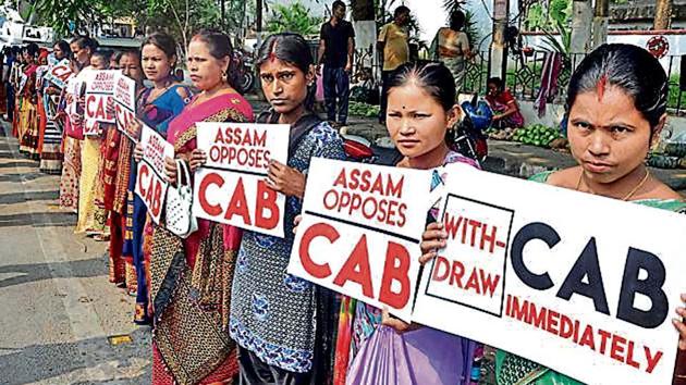 Activists of the Krishak Mukti Sangram Samiti (KMSS) hold placards during a protest against the Citizenship (Amendment) Bill 2016, in Guwahati on Monday.(ANI Photo)