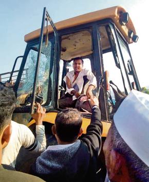 According to police officials, the driver of the earthmover lost control of the vehicle due to a brake failure (HT PHOTO) According to police officials, the driver of the earthmover lost control of the vehicle due to a brake failure (HT PHOTO)