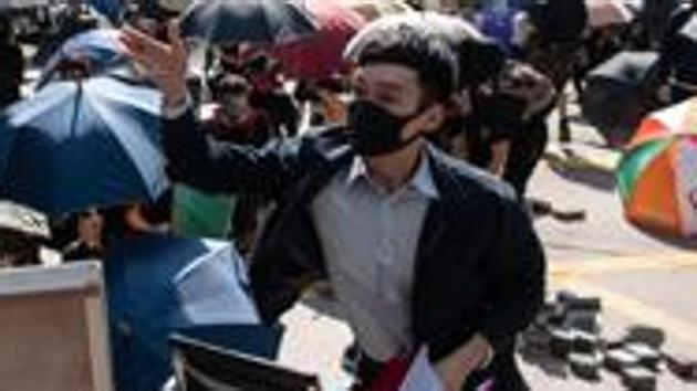 Hong Kong local court nullified a ban that banned protesters from wearing face masks. (Bloomberg Photo) Hong Kong local court nullified a ban that banned protesters from wearing face masks. (Bloomberg Photo)