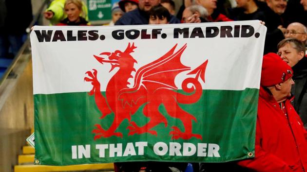 Fans display a Wales flag in reference to Gareth Bale.(Reuters)