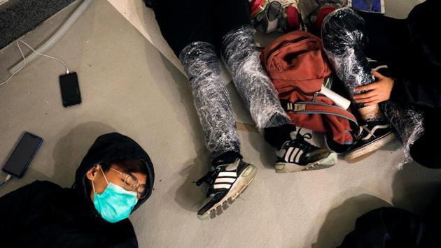 The unrest marks the most serious popular challenge to Chinese President Xi Jinping since he came to power in 2012. Some protesters have surrendered while others were held during escape attempts that included clambering down from a bridge to waiting motorbikes and fleeing through the sewers. (Adnan Abidi / REUTERS)