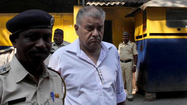 Peter Mukerjea being produced at the Esplanade Court in Mumbai in 2015. (Bhushan Koyande/ Hindustan Times) Peter Mukerjea being produced at the Esplanade Court in Mumbai in 2015. (Bhushan Koyande/ Hindustan Times)
